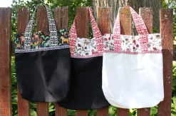 Leksand mini svart tyg med traditionellt dalahästtryck