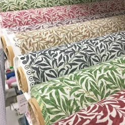 Ramas grön tyg med kvistar och blad