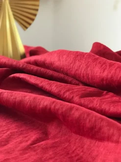 Stentvättat linnetyg Duvemåla röd